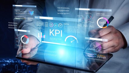 Fototapeta premium Business Professional Analyzing Digital Dashboard with KPI Metrics and Data Visualization on Tablet Screen in Modern Office Environment Gluon.