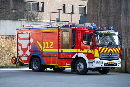 Red fire department rescue truck, city of Esch sur Alzette, Luxembourg, emergency response, public safety service, urban mobility, Le Fonds Belval 
