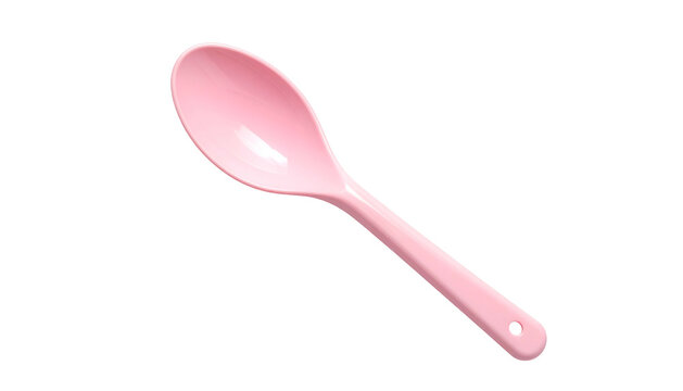 A close-up view of a pink spoon against a stark black background. It appears to be made of a glossy material