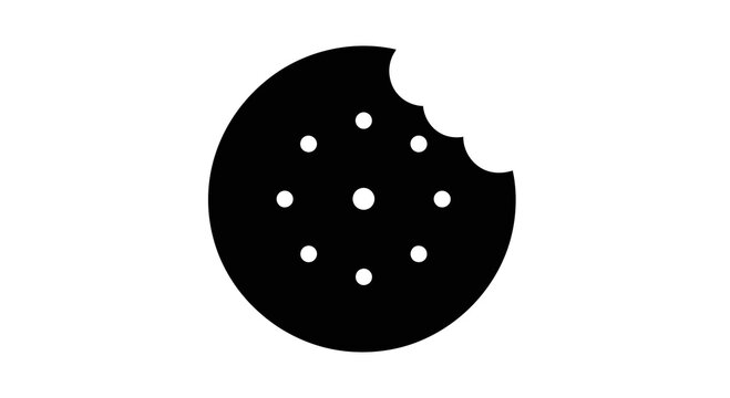 A bitten black cookie with white dots on a white background is depicted.