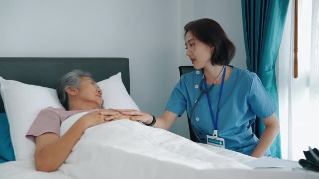 Professional nurse checking and comforting senior patient in bed, healthcare, compassion, and medical support concept
