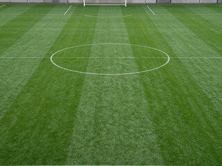 Obraz premium Soccer field grass background with stadium and football pitch lines