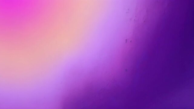 A vibrant gradient blending purple and pink tones in an abstract style.