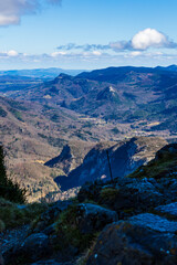 Obraz premium Spring panorama over the Ariège mountains with snow-capped peaks from Montségur Castle, France