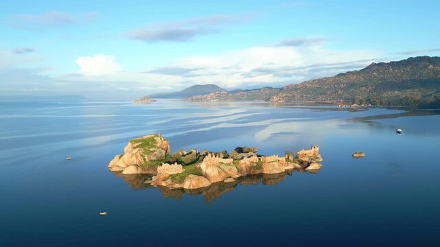 Panoramic View of Ancient Monastery Ruins on Bafa Lake Island at Dawn. High quality 4k footage