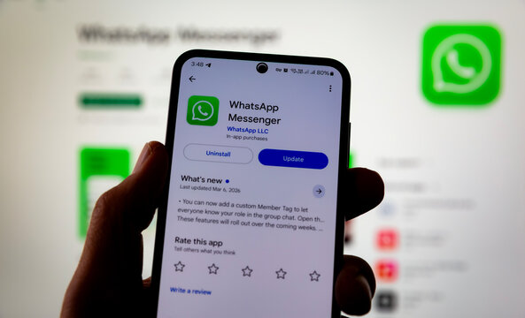 Smartphone Displaying WhatsApp Messenger App Page With Update And Uninstall Options In Mobile Store. Messaging Platform Interface Showing Features Updates And User Ratings On Android Device Editorial 