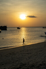 Fototapeta premium Sunset and Coastal Life in Zanzibar, Tanzania