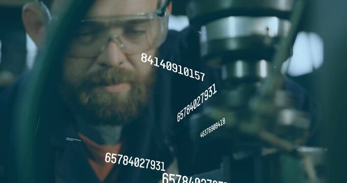 Vertical video: Moving tech checking tool and spindle in shop with goggles while data shifting