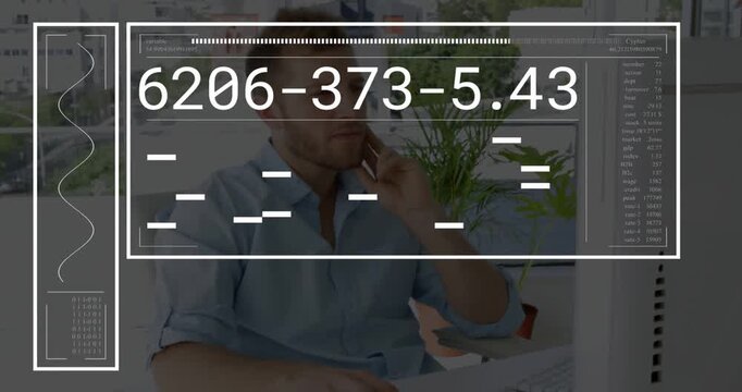 Vertical video: Typing man in blue shirt reading HUD codes with overlay appearing, writing on pad