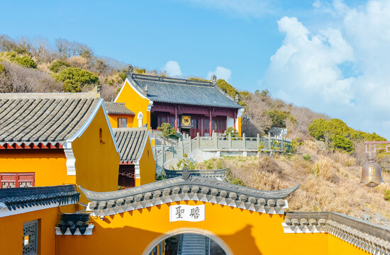 Buddhist temple architecture on the hillside of Fanyin Ancient Cave (Fanyindong, Fanyin Cave) in Mount Putuo, Zhoushan, Ningbo, Zhejiang, China