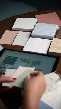 Clean aesthetic flat lay video of architect choosing materials for deign project in office, 4k interior design background video