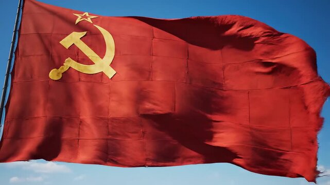 Red flag with hammer and sickle waving