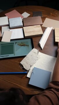 Interior design mood board with color palette samples for home renovation project, 4k office table video 
