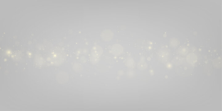 Golden glitter dust bursts into luminous bokeh circles, creating a festive and elegant visual texture. Tiny sparks scatter like shooting stars across the frame. Suitable for premium design projects.