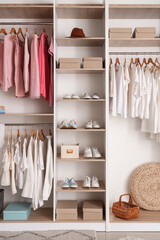 Modern wardrobe with stylish spring clothes and accessories