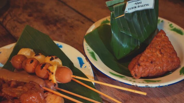 Traditional Malaysian Cuisine with Nasi Dagang and Skewers
