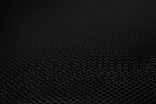 Macro Texture of Black Breathable Mesh Fabric with Selective Focus