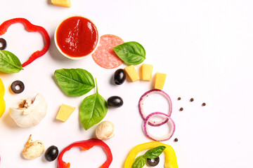 Naklejka premium Ingredients for preparing pizza on white background