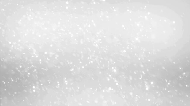 Snowflakes falling gently in the air with a soft focus effect creating a serene winter atmosphere with delicate white particles suspended