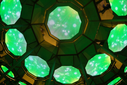 Emerald Green lighting to show on the ceiling of hall.