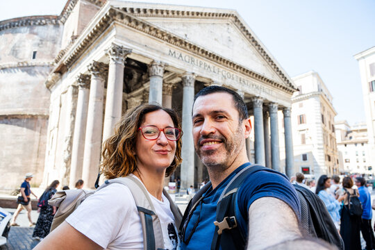 Couple Captures Joyful Moment at the Pantheon of Agrippa in Rome on a Bright Sunny Day