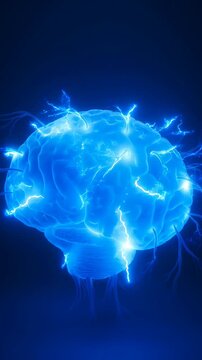 Slow motion tracking shot of glowing human brain rotating with electrical impulses in dark laboratory