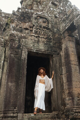 Traveler at Bayon Temple Entrance, Angkor Thom, Cambodia
