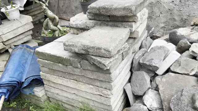 Stack of natural flat stones for garden pathway and landscaping