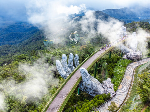 Da Nang, Vietnam - January 02 2026: Aerial view of Da Nang Golden bridge in Bana Hills which is a very famous checkin place for tourists.