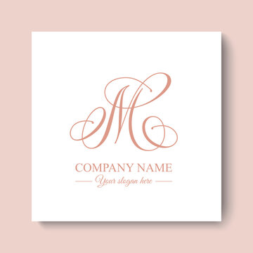 Elegant M letter logo monogram in luxury style with flowing calligraphy lines, premium branding template for boutique, beauty salon and wedding business 
