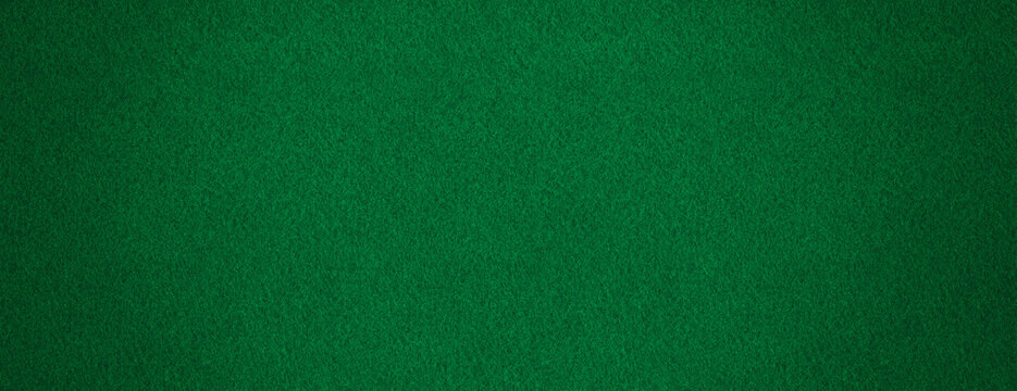 Green color fabric background texture &ndash; dark cloth canvas surface. Long wide felt backdrop.