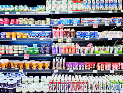 Latvia, Riga, 25, June, 2025 - Delicious and healthy bio dairy products on shelf of supermarket in Riga. Latvia. Natural products without milk fat substitute. Food quality concept.