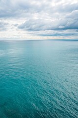 Obraz premium Top view of light blue ocean