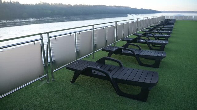 Sun loungers on the upper deck of the ship