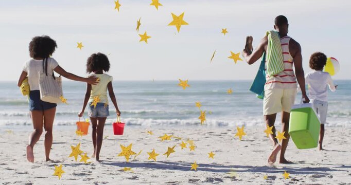 Family spotting ocean and walking toward shore for beach play, stars floating between group and sea