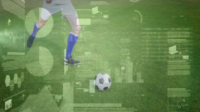 Male player moving, planting foot and kicking, sending ball right with sports HUD charts overlay