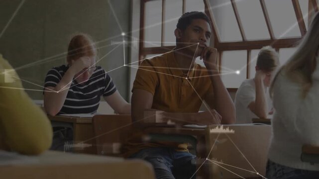 Vertical video: Noticing HUD appearing, teen in mustard polo writing and working classwork in class