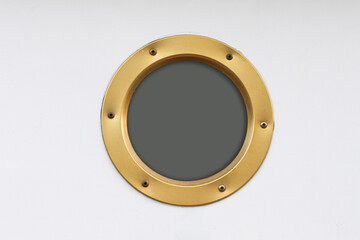 Naklejka premium Round ship porthole isolated on white background. Marine window on cabin door with metal frame. Nautical element with copy space, minimal design and clean studio look.