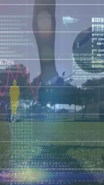 Vertical video: Male athlete stepping instep tapping, sending ball up for soccer drill HUD tracking