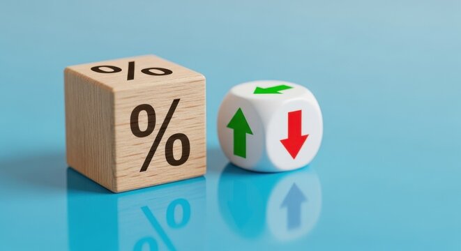 Wooden cube with percentage symbol next to white dice showing green up and red down arrows on blue background