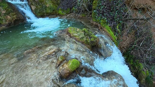 Water Flowing into small waterfall. Ozren Mountain, Sokobanja region (Ripaljka Waterfall). Balkans, Serbia.