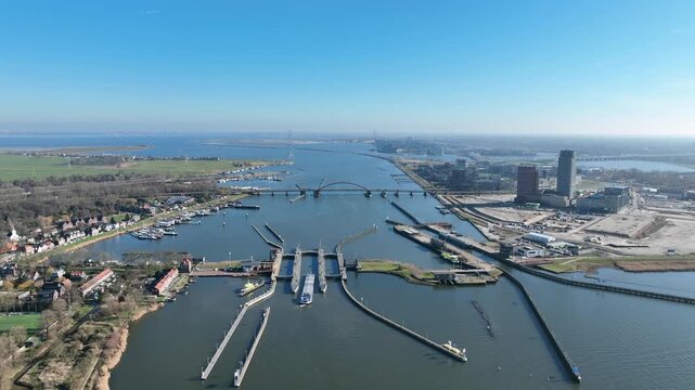 Orange sluices in Amsterdam harbor in Europe