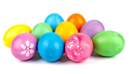 Obraz premium A vibrant cluster of painted eggs in various hues, showcasing details and textures against a white backdrop