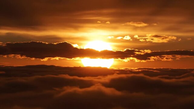 beautiful sunset above the clouds with sun shining through above the clouds beautiful sky cloudy sce