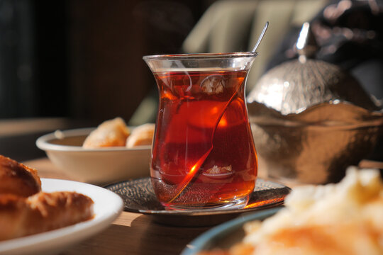 turkish tea served with snacks in a cozy cafe setting