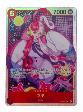 Hamburg, Germany - 02082026: detail macro photo of a japanese one piece paper trading card with a female character UTA on it from the Heroines Edition Set on white. She is a famous singer Diva.