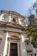 Obraz premium Facade of the Church of San Filippo Neri (Chiesa Nuova), a major baroque monument built 1627-1665 by architect Paolo Maruscelli, in travertine, on Piazza Baldassarre Ferri, Umbria, Italy.