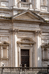Obraz premium Facade of the Church of San Filippo Neri (Chiesa Nuova), a major baroque monument built 1627-1665 by architect Paolo Maruscelli, in travertine, on Piazza Baldassarre Ferri, Umbria, Italy.