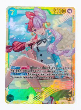Hamburg, Germany - 02082026: macro photo of a japanese one piece paper trading card with a female character UTA on it from the Heroines Edition Set on white. She is a famous singer Diva.