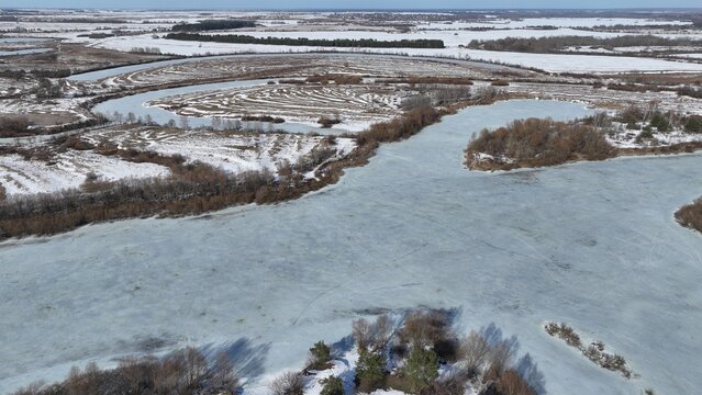 Permafrost in Russia. What permafrost looks like. A frozen river. Snow-covered taiga. Unusual winter landscapes.